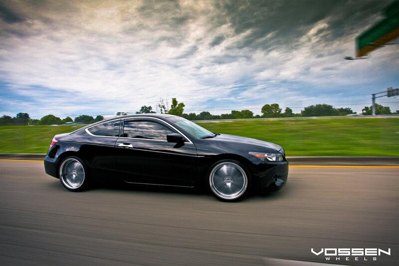 black coupe in motion