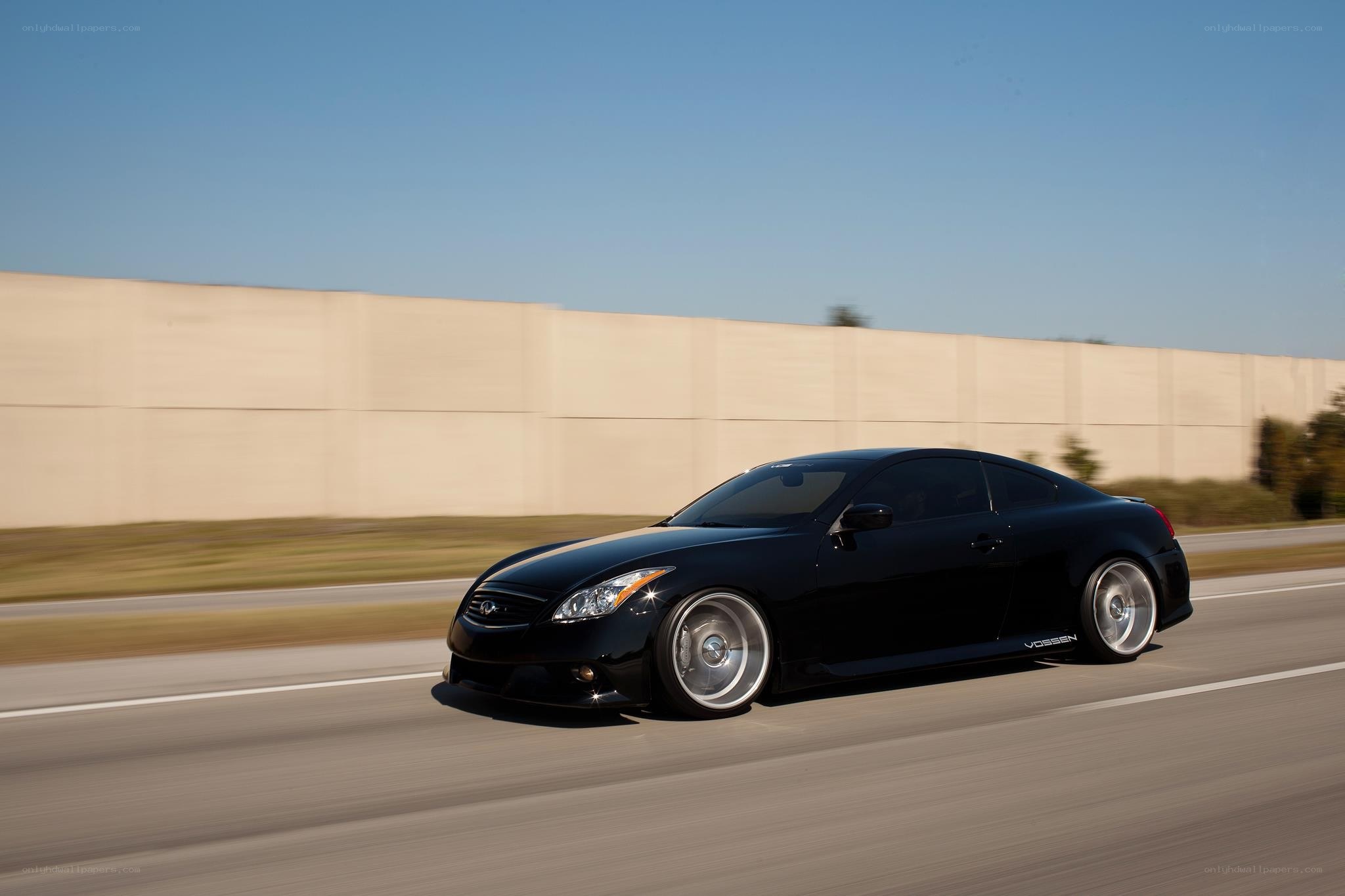 black coupe on a highway