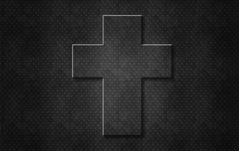 black cross on metal background