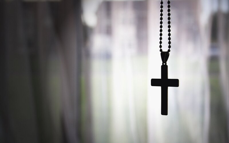 black cross pendant