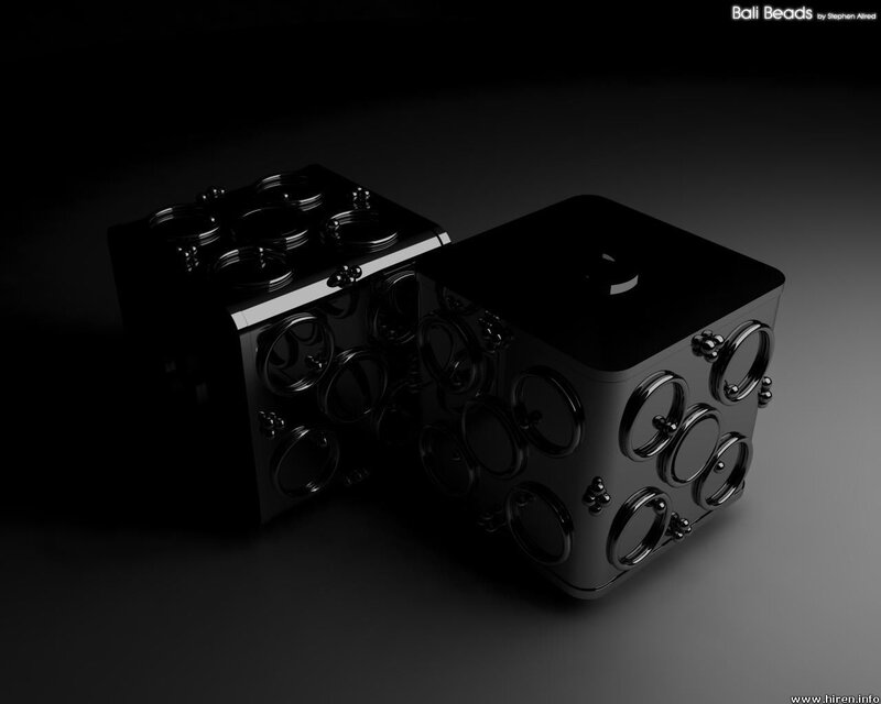 Black cube with circular cutouts