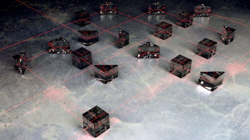 black cubes with red laser grid