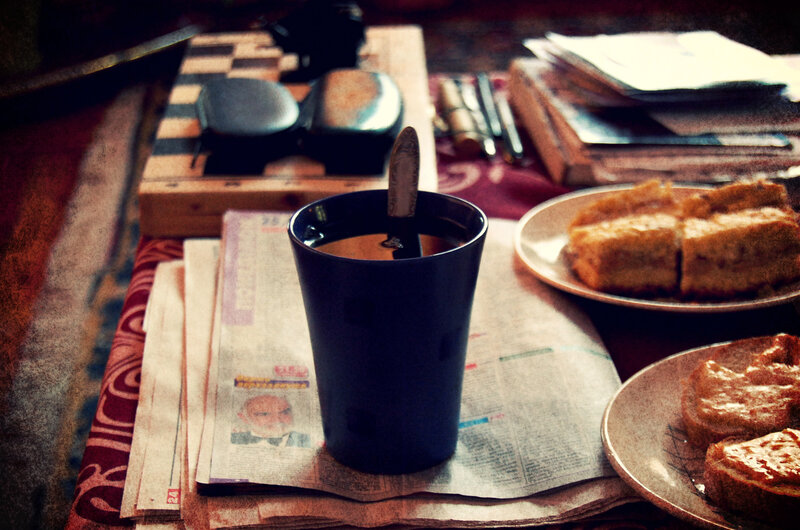 Black Cup on Newspaper