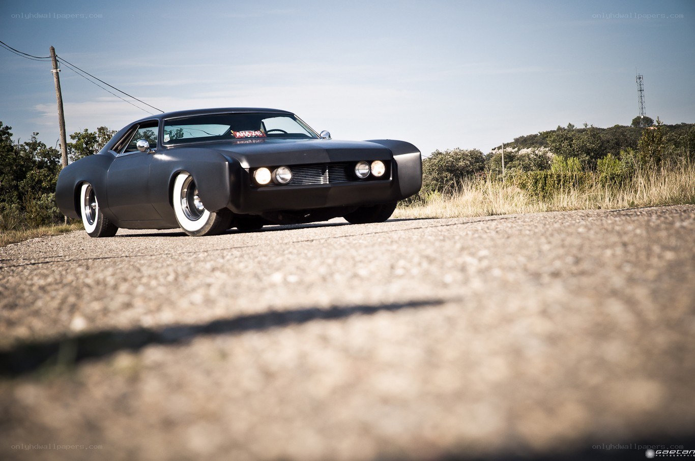 black custom car on road