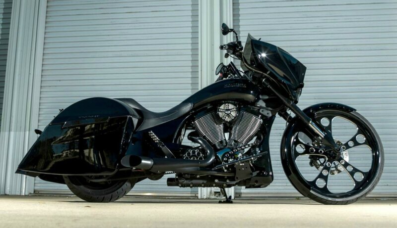 Black Custom Motorcycle — Dramatic, Afternoon, Photograph, Garage Door