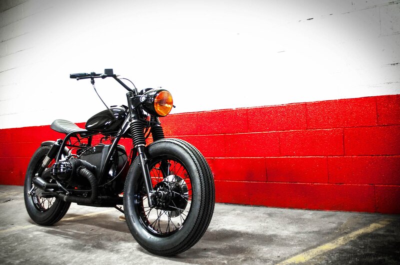 Black Custom Motorcycle — Dramatic, Photograph, Red Wall