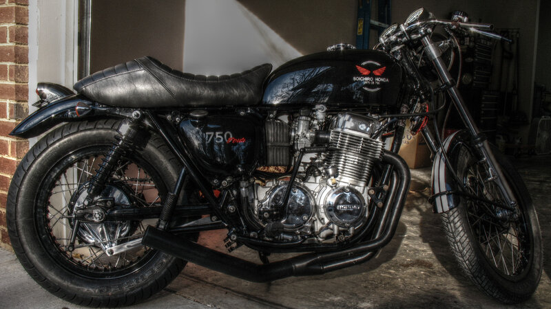black custom motorcycle in garage