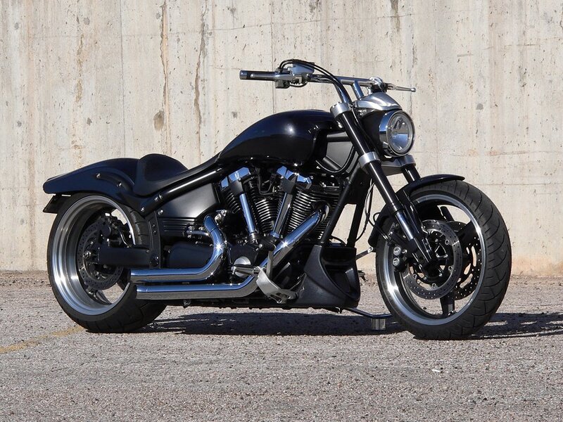 Black Custom Motorcycle — Neutral, Afternoon, Photograph, Concrete Wall