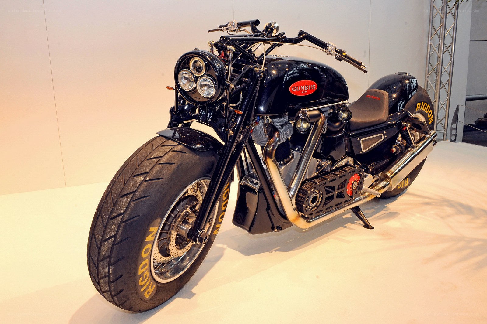 Black custom motorcycle on display