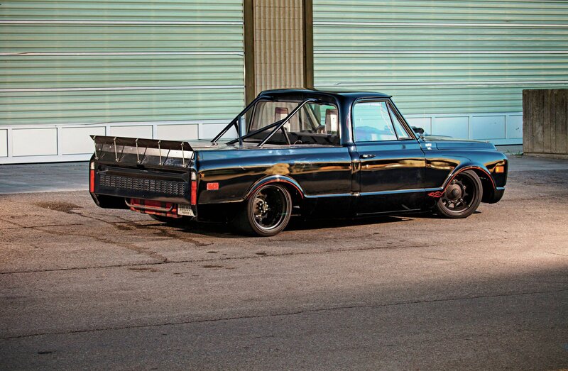 Black Custom Pickup Truck — Dramatic, Afternoon, Photograph, Garage Door