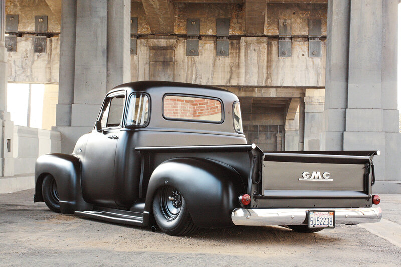Black Custom Pickup Truck — Dramatic, Photograph, Concrete Pillars