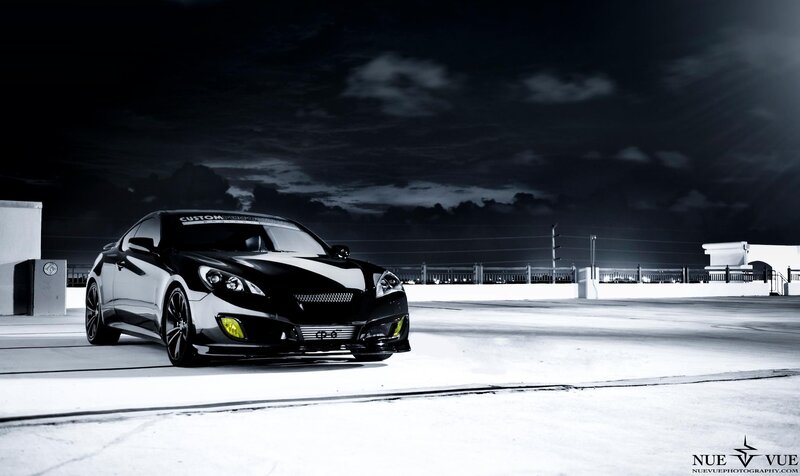 black custom sports car at night