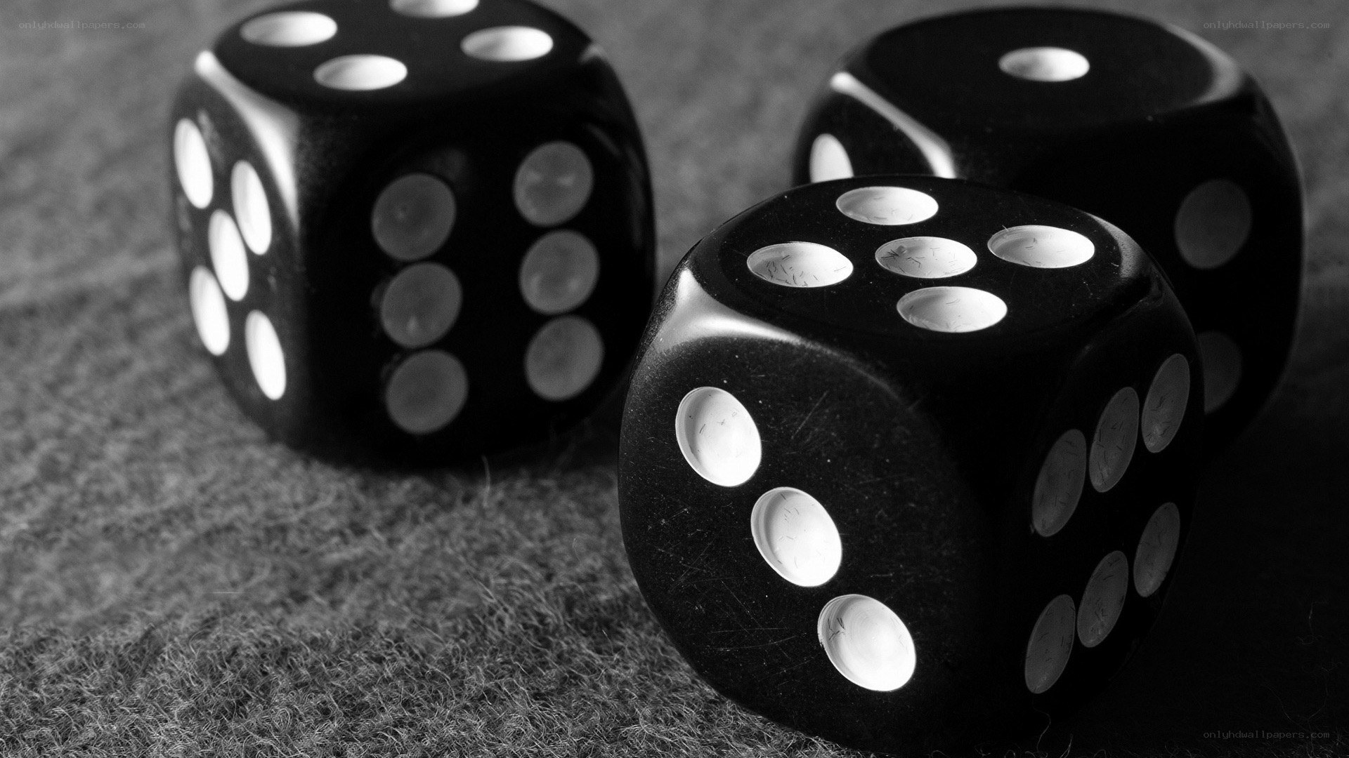 black dice on textured surface