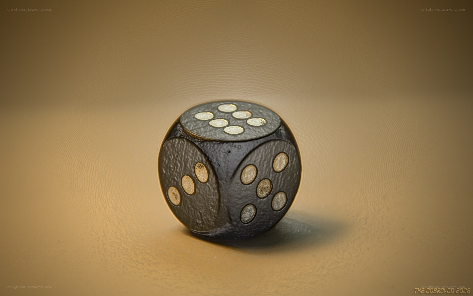 black die with gold dots