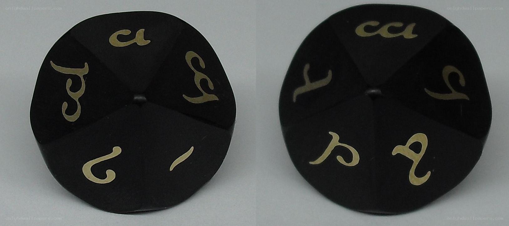 black die with gold symbols