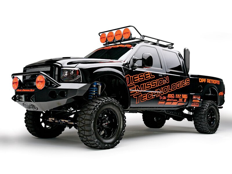 black diesel truck with orange decals