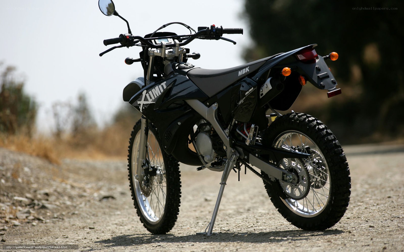 black dirt bike on road
