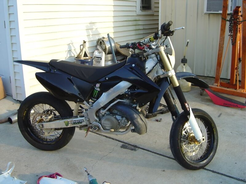 black dirt bike outside house