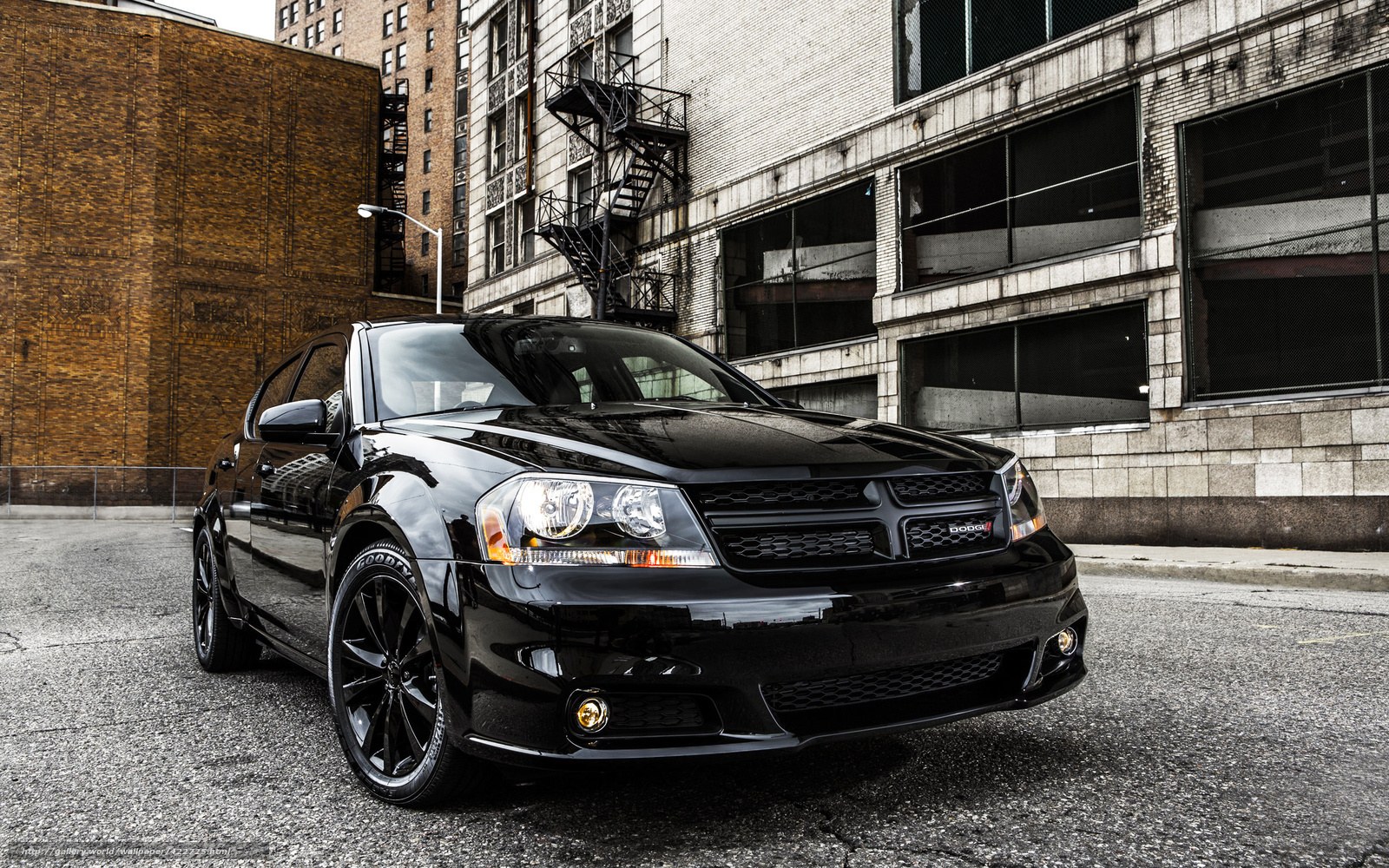 Black Dodge Avenger in urban setting