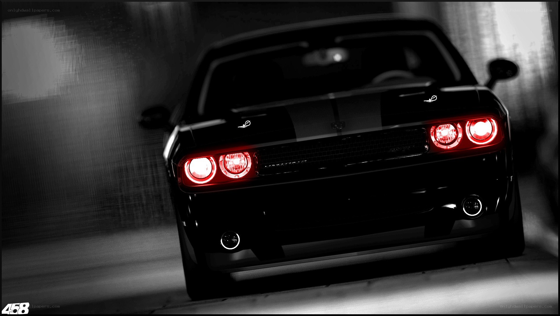 black dodge challenger at night