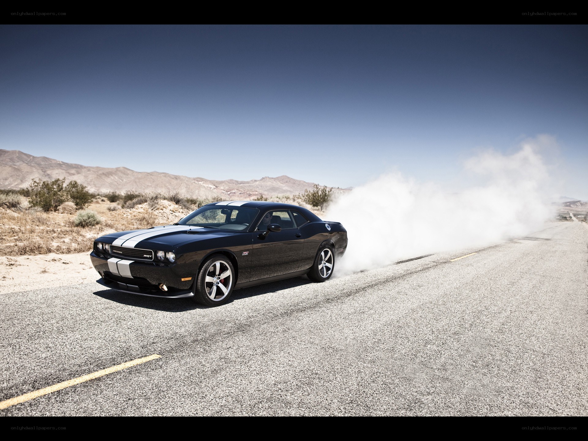 Black Dodge Challenger burnout