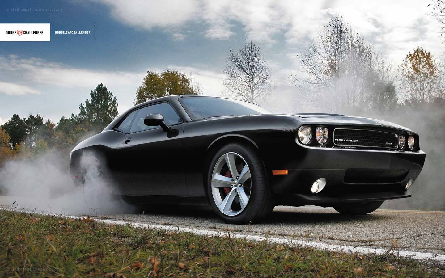 Black Dodge Challenger burnout