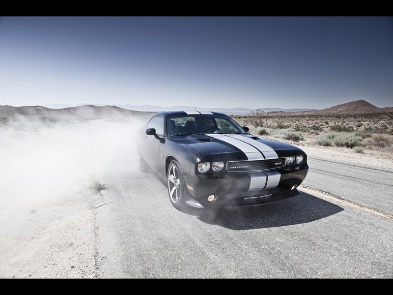 Black Dodge Challenger drifting