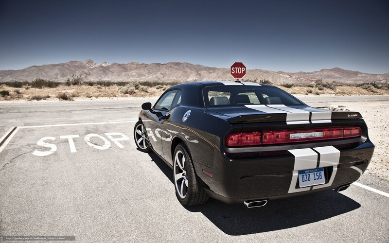 Black Dodge Challenger in desert
