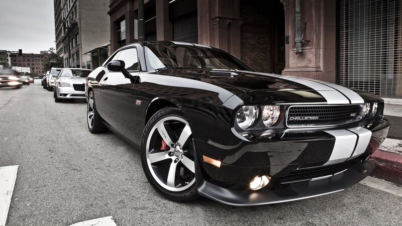 Black Dodge Challenger on city street