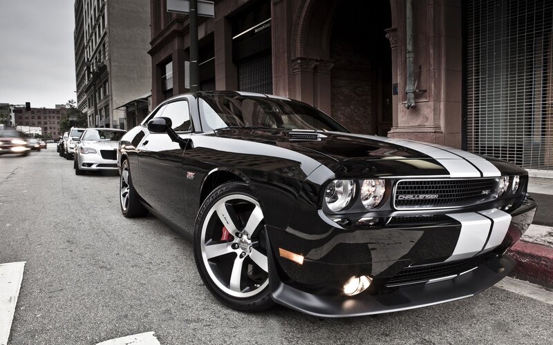 Black Dodge Challenger on city street