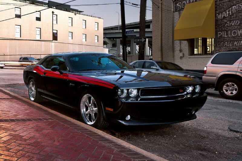 Black Dodge Challenger on city street