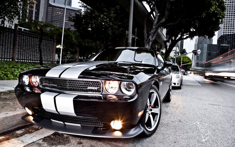 Black Dodge Challenger on city street