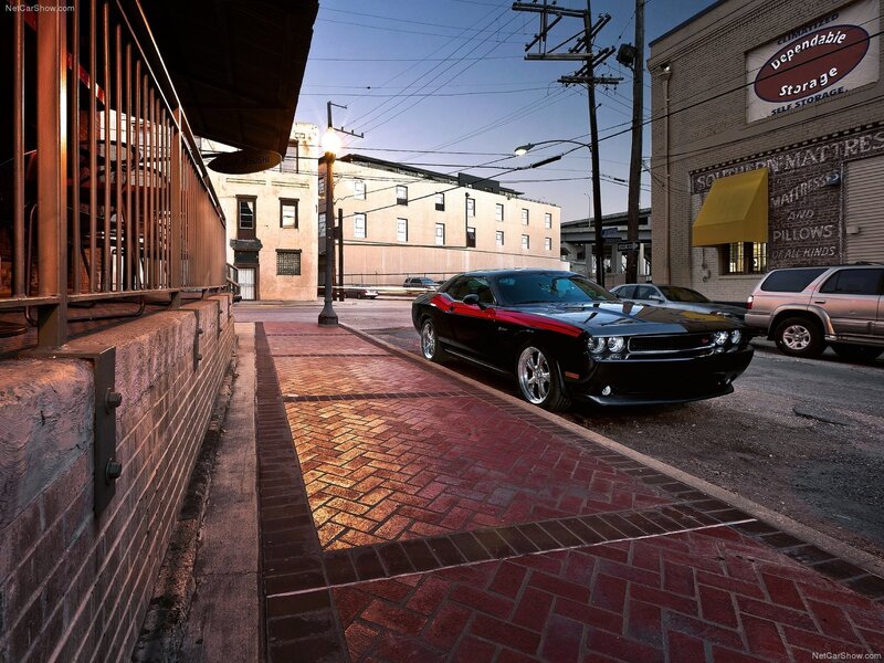 Black Dodge Challenger on city street