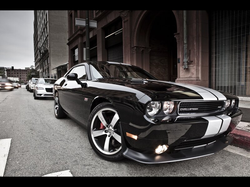 Black Dodge Challenger on city street