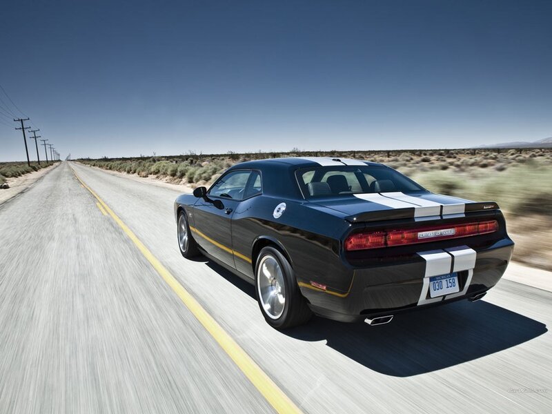 black dodge challenger on desert road