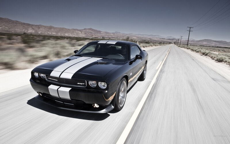 black dodge challenger on desert road