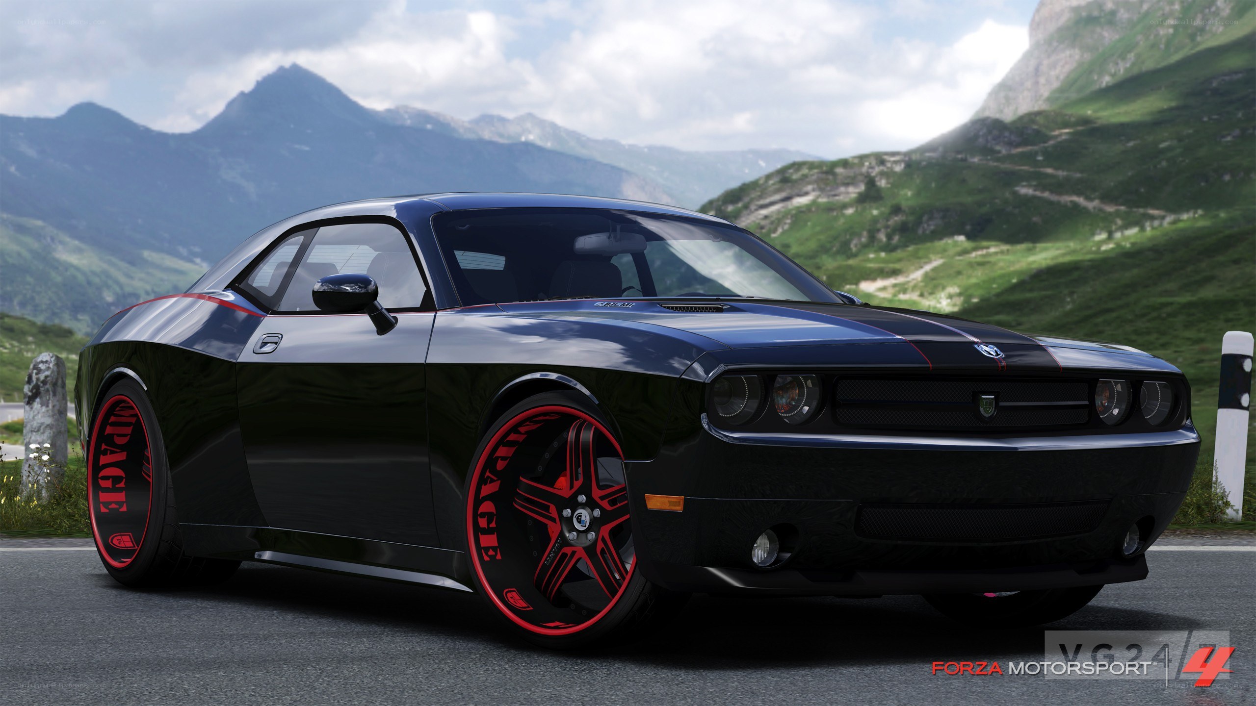 Black Dodge Challenger on mountain road