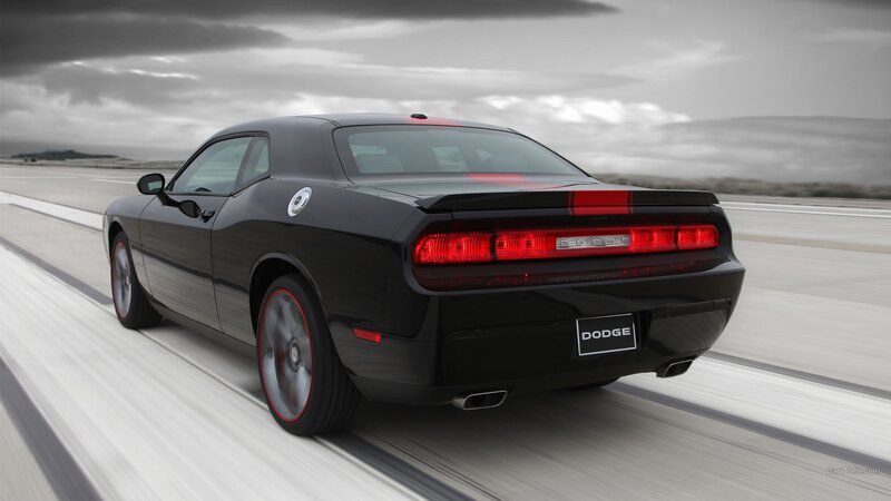 black dodge challenger on track
