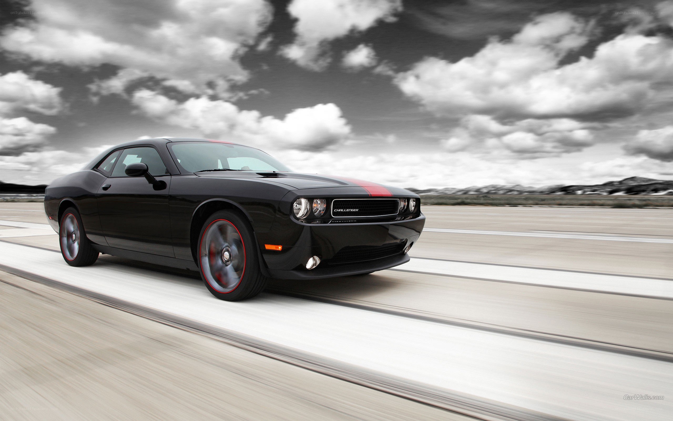 Black Dodge Challenger on track