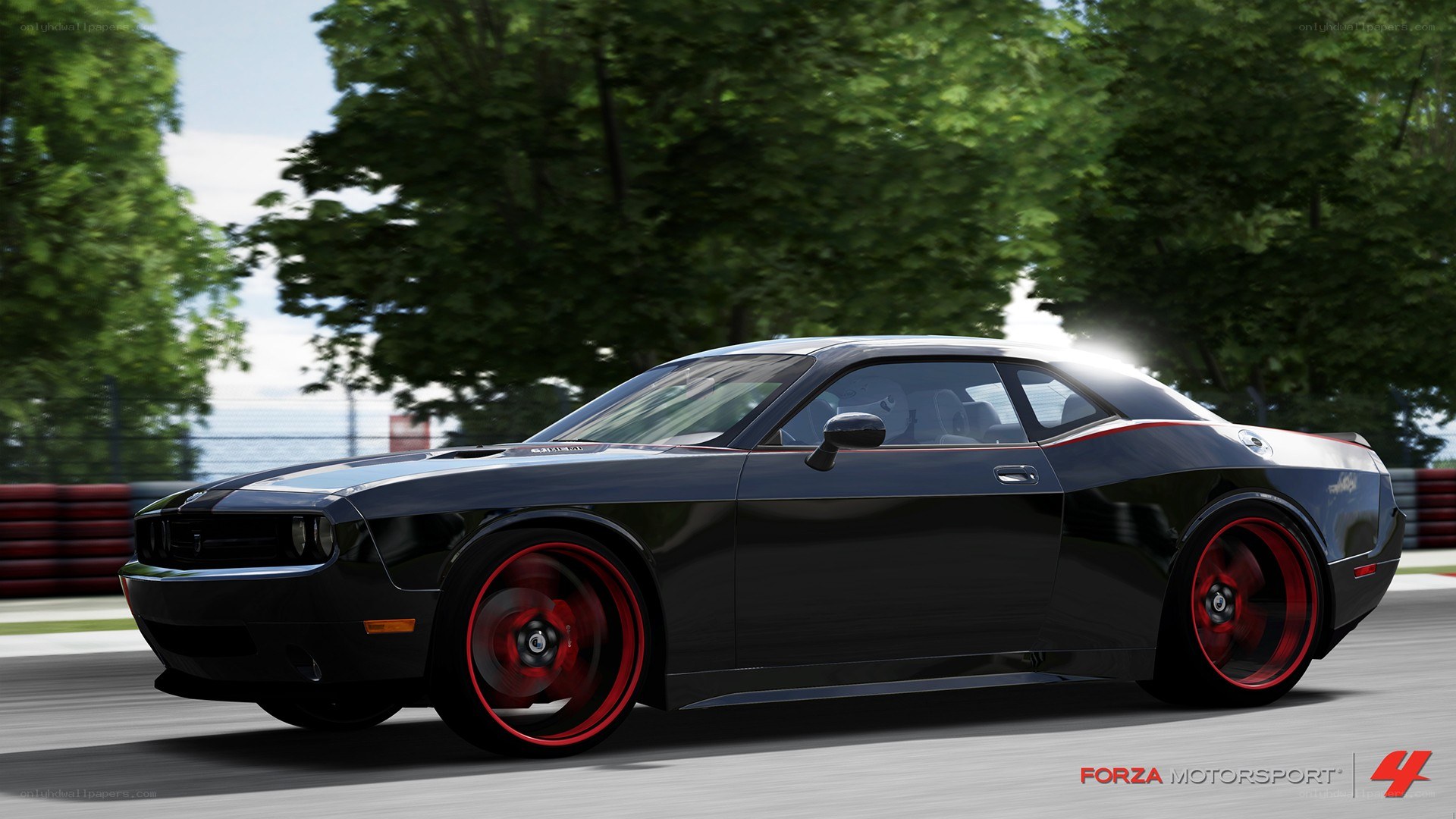 black dodge challenger on track
