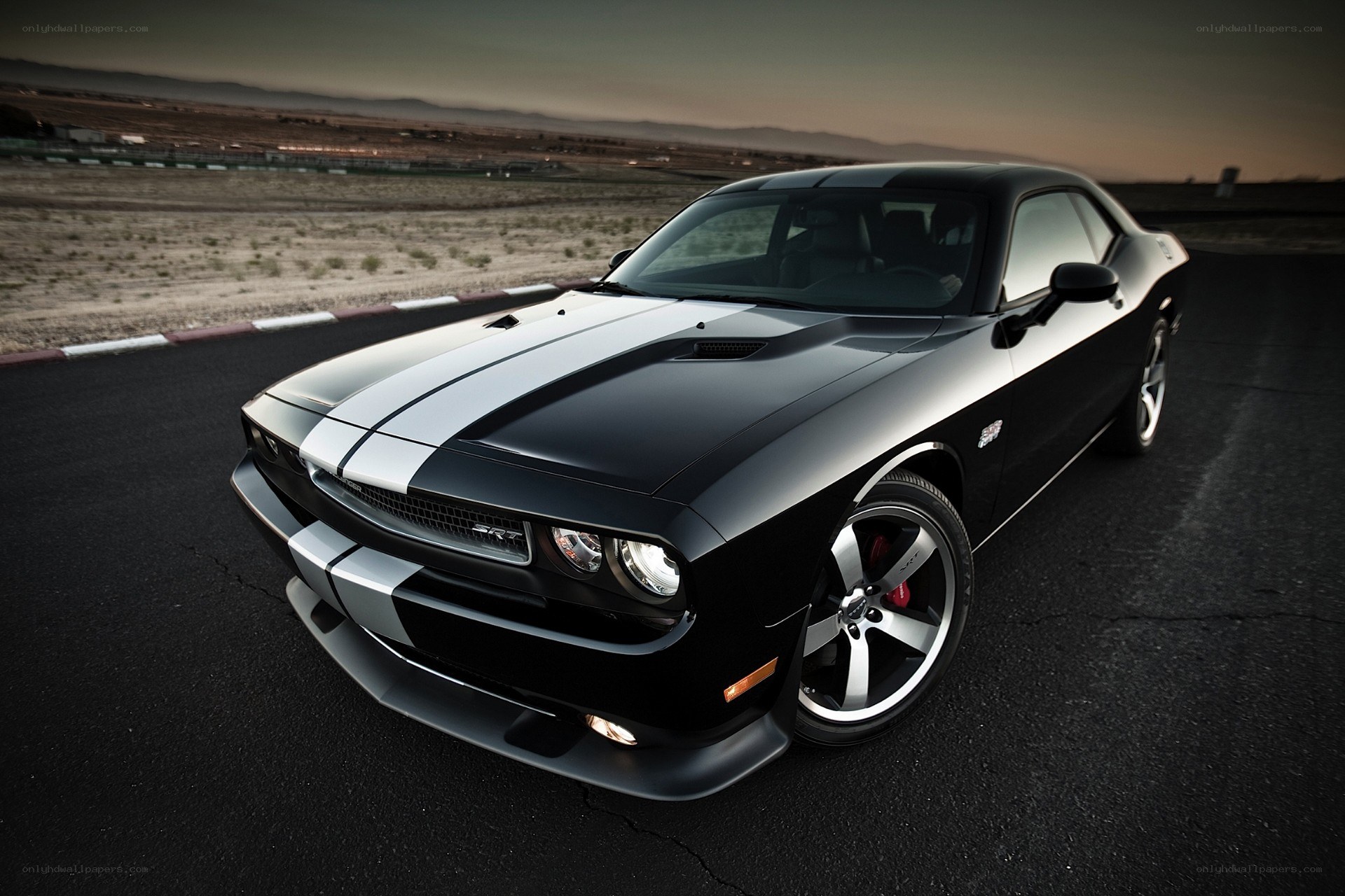 Black Dodge Challenger on track