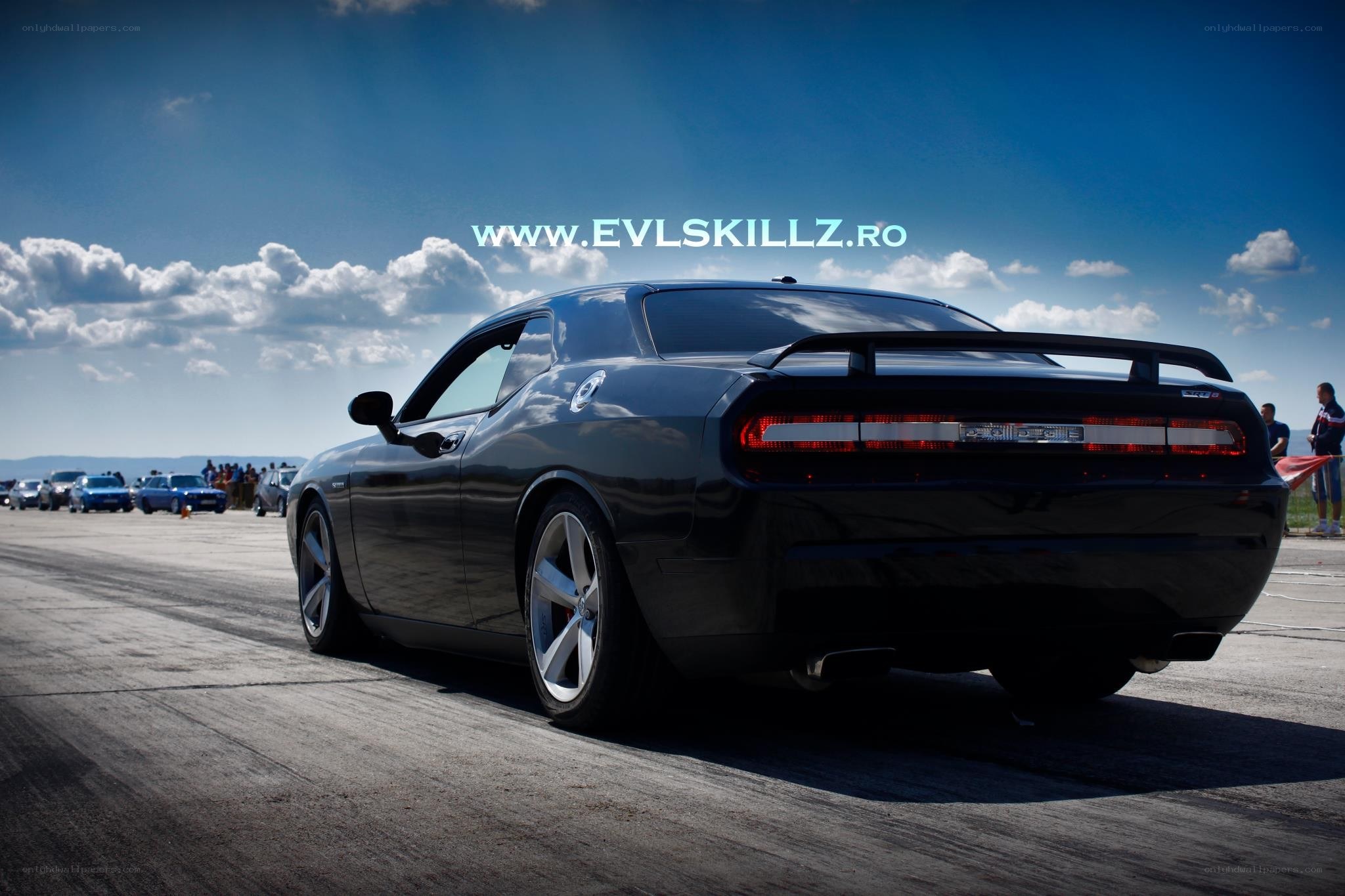 Black Dodge Challenger on track