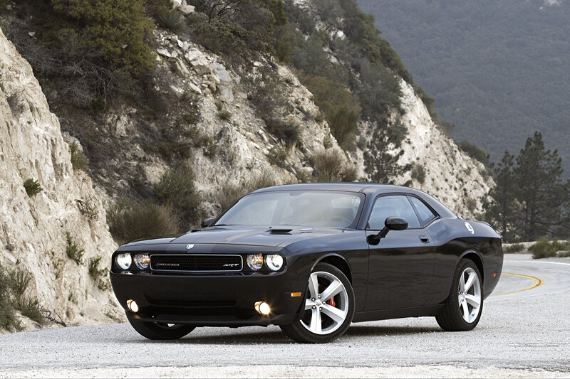 Black Dodge Challenger SRT on mountain road