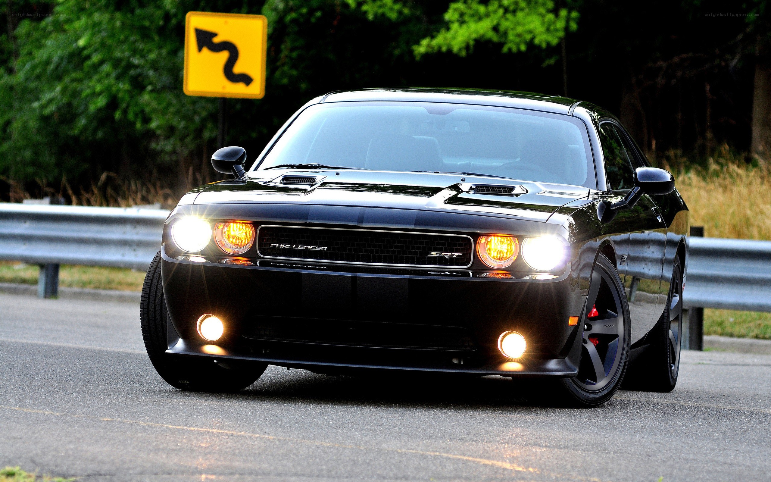 Black Dodge Challenger SRT on road