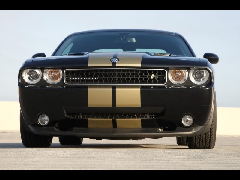 Black Dodge Challenger with gold stripes