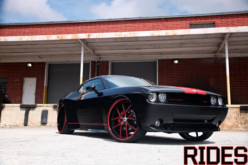 Black Dodge Challenger with red accents