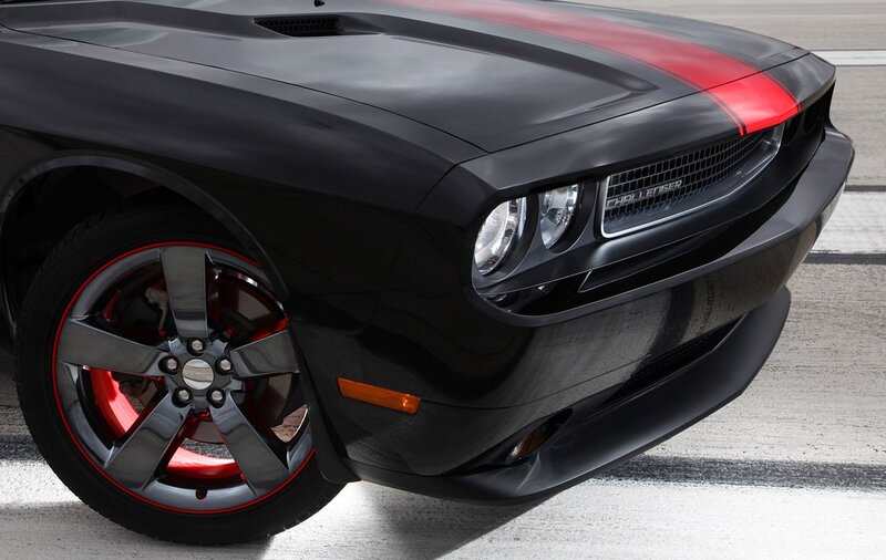 Black Dodge Challenger with red accents