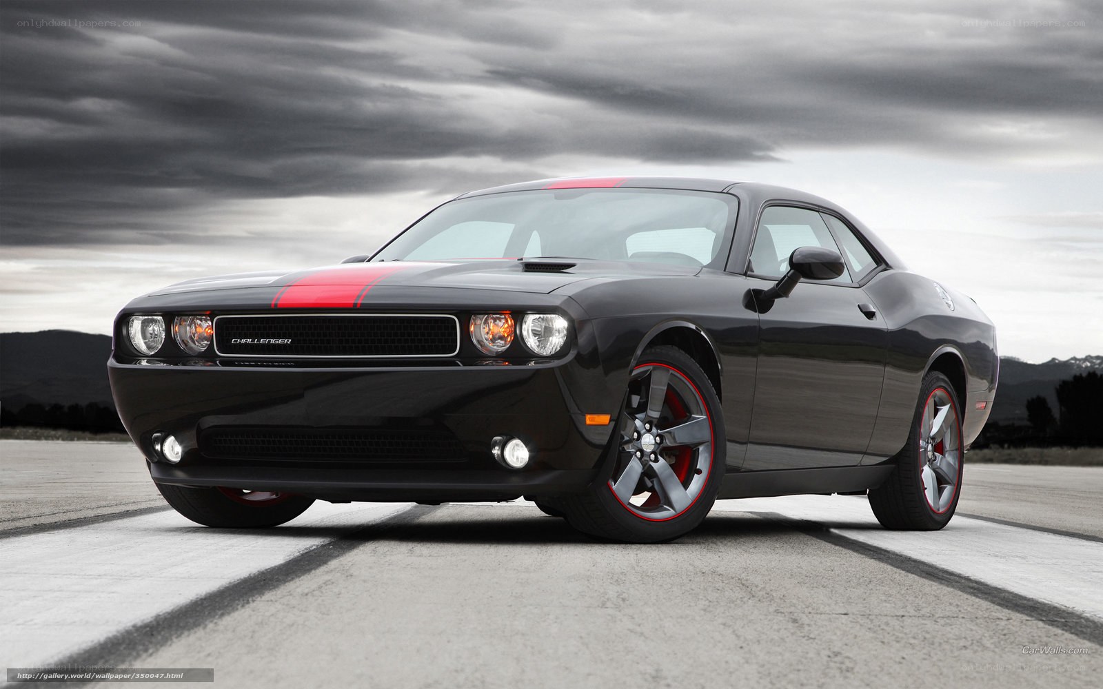 Black Dodge Challenger with red stripes