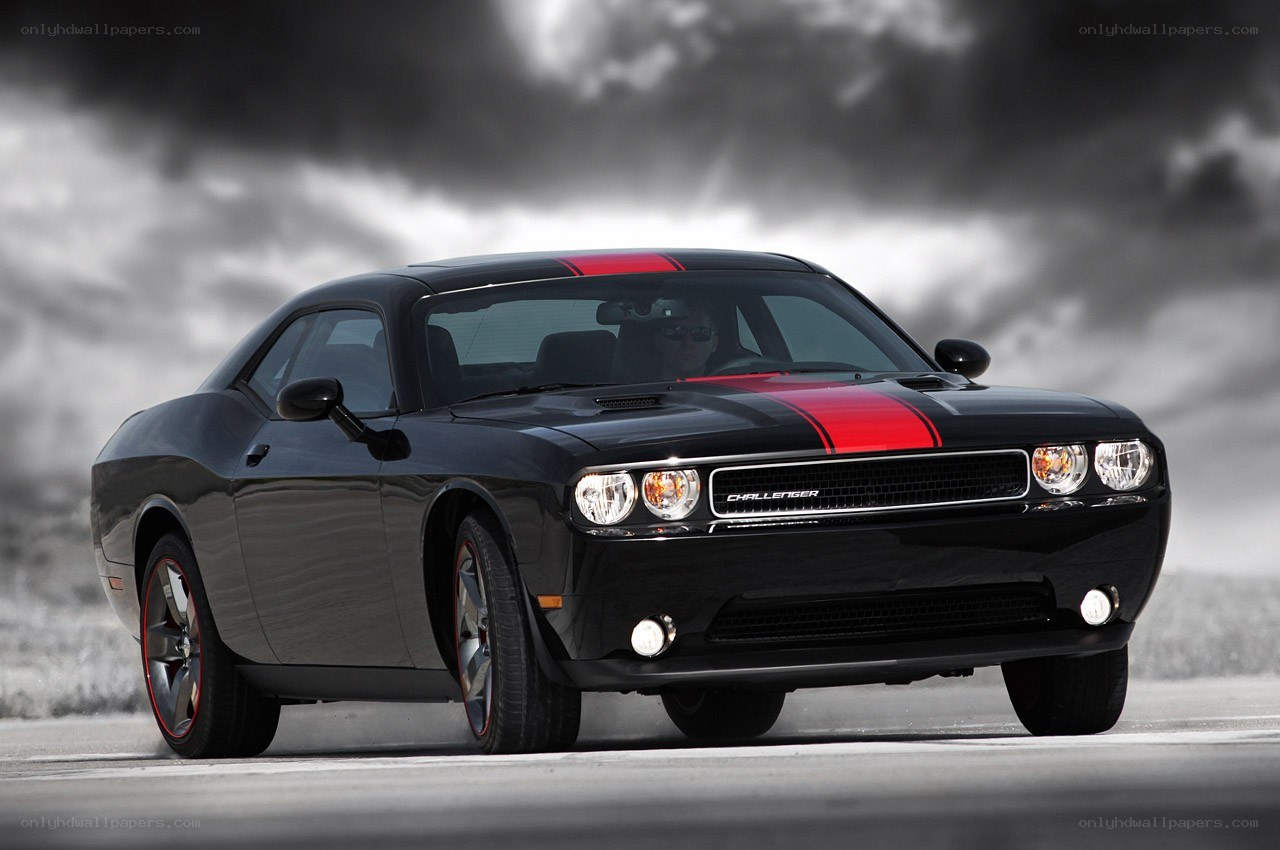 Black Dodge Challenger with red stripes