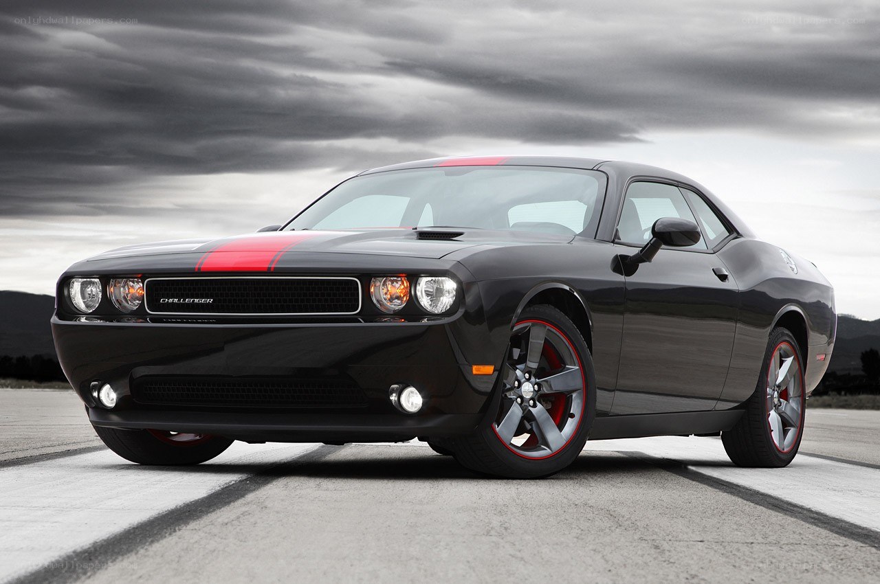 Black Dodge Challenger with red stripes